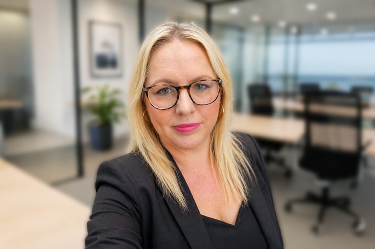 a women looking professional in an office headshot